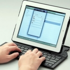  iPad Case unfolds to Provide a full-sized Bluetooth Keyboard